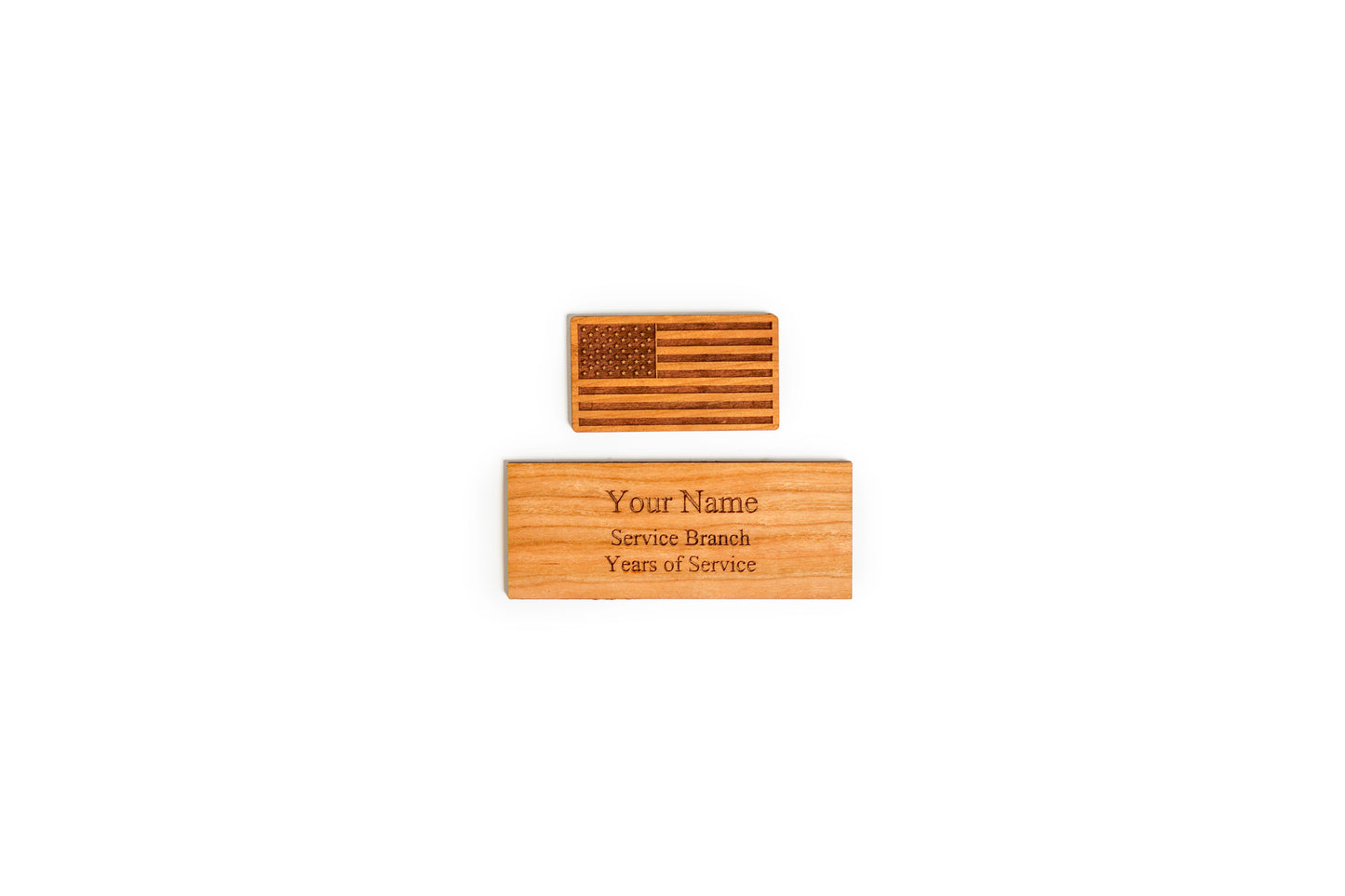 Detailed view of the custom laser engraving on the wooden nameplate for the Coast Guard sword display.